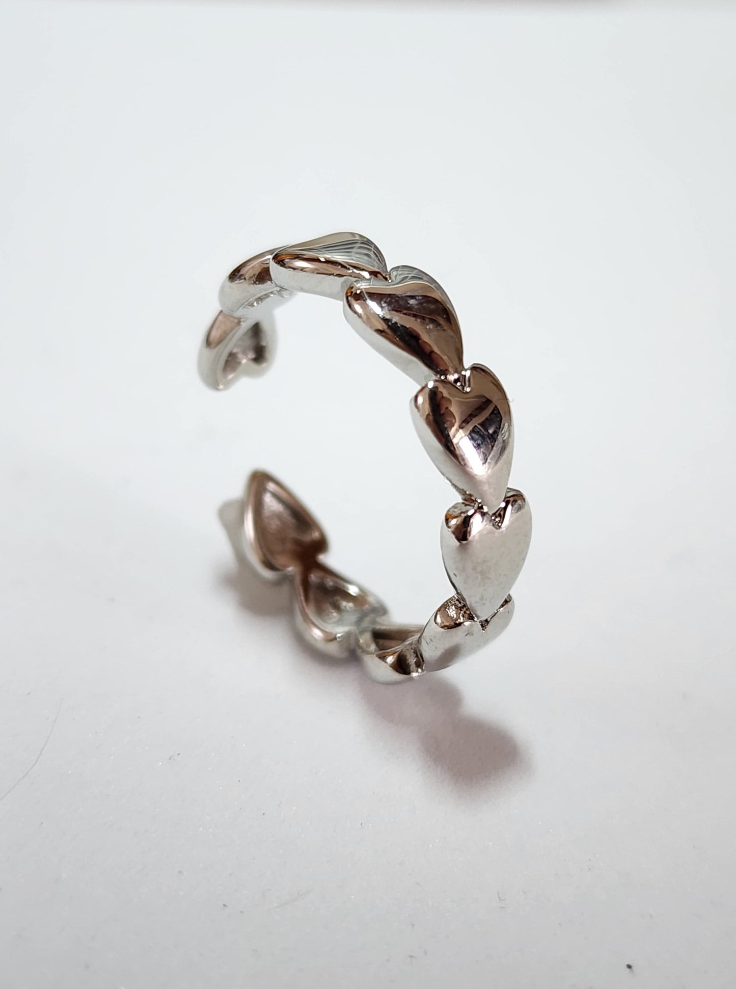 Anillo Corazones Plateado Acero Inox. Ajustable