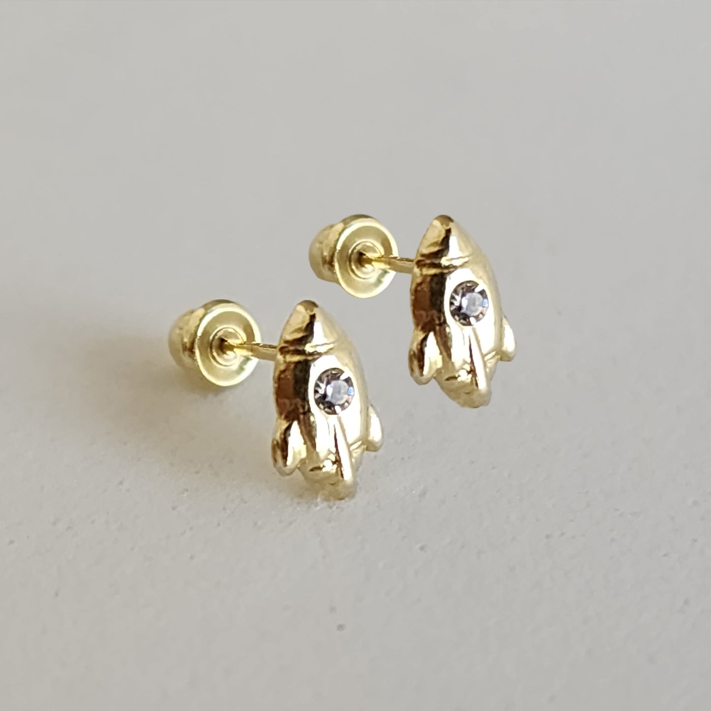 Aretes Cohete Mini Zirconia, Oro 10K Tipo Broquel