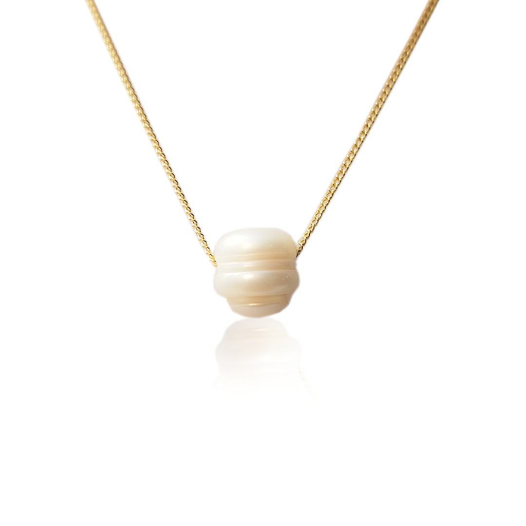 Dije perla Chapa de Oro